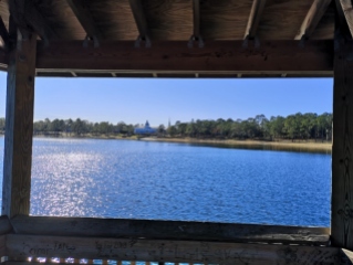 View across the lake at the Hall of the Brotherhood from one of the two piers